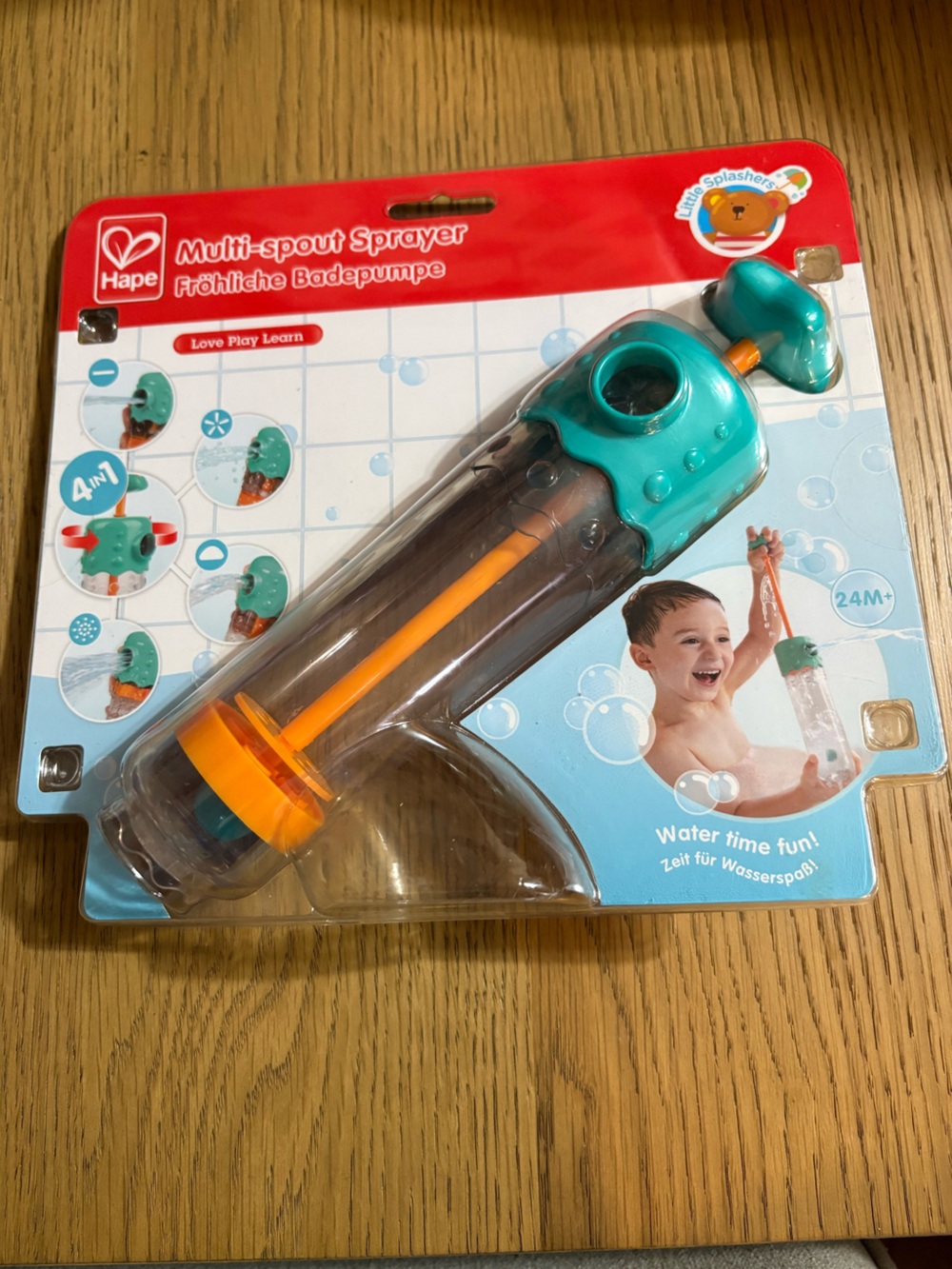 Hape Multi-Spout Sprayer Bath Toy – Teal & Orange